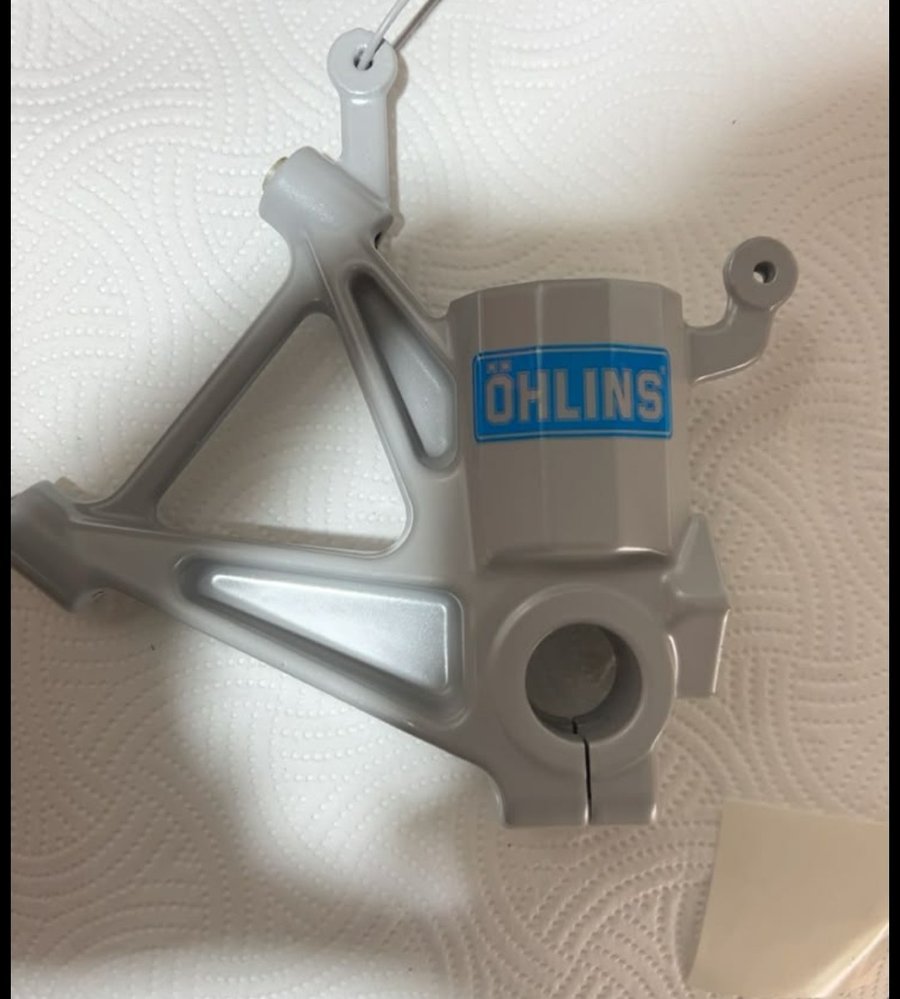 Refinished Öhlins suspension linkage